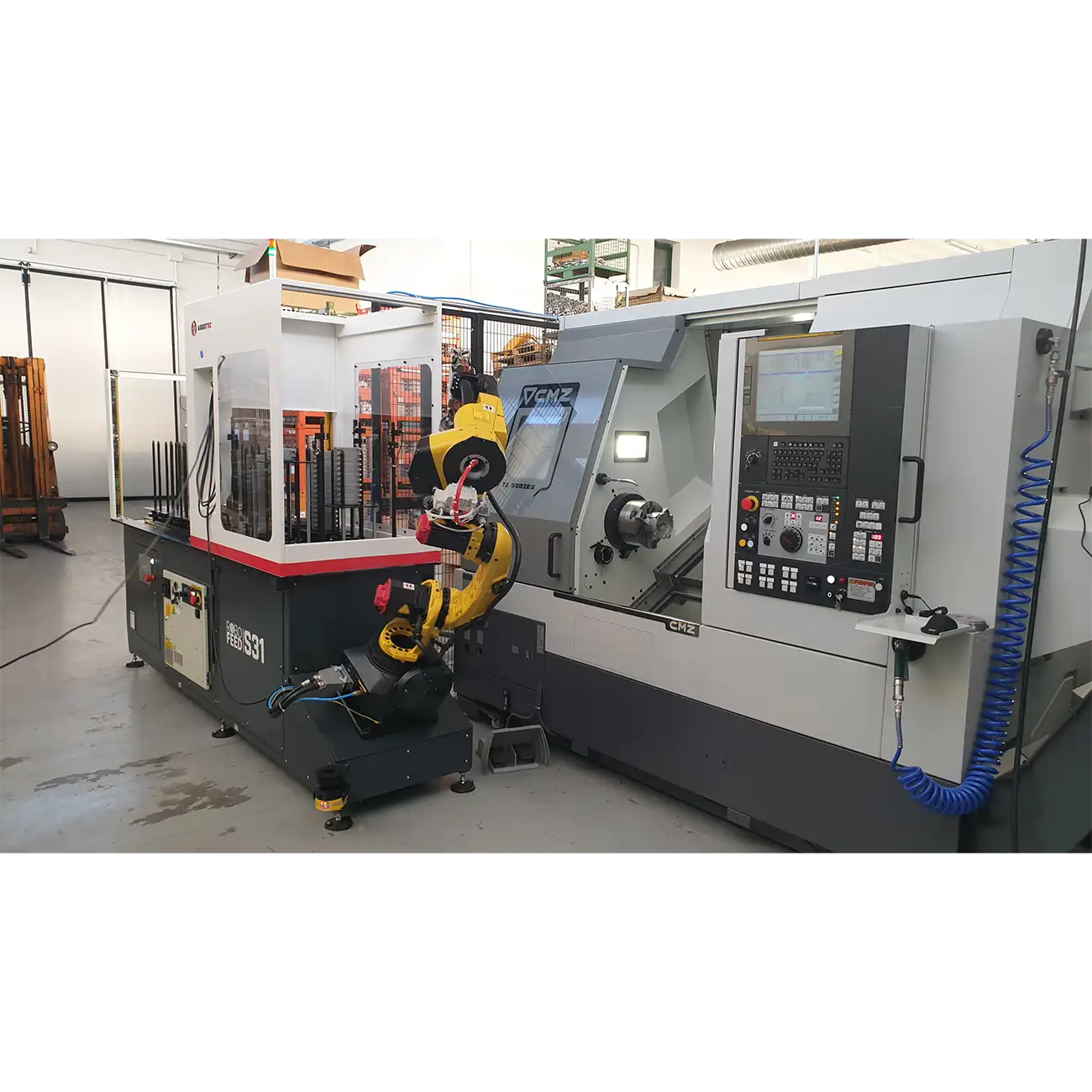 ROBO FEED S31 che asserve il tornio CMZ mod. TA20YS copia 2